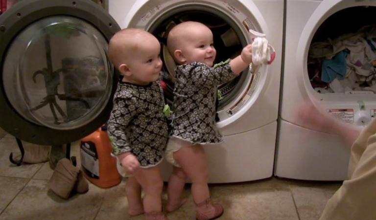 Little twin babies are the best helpers of their mother…