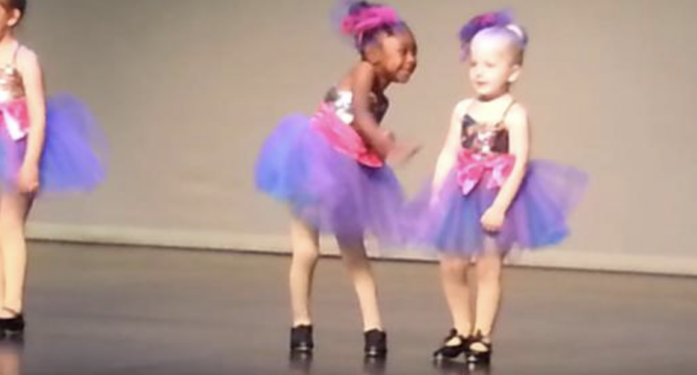 Preschool Girl Performs Own Choreography During Recital