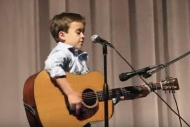 Boy Masters The Guitar Sounding Just Like Johnny Cash During Cover Performance