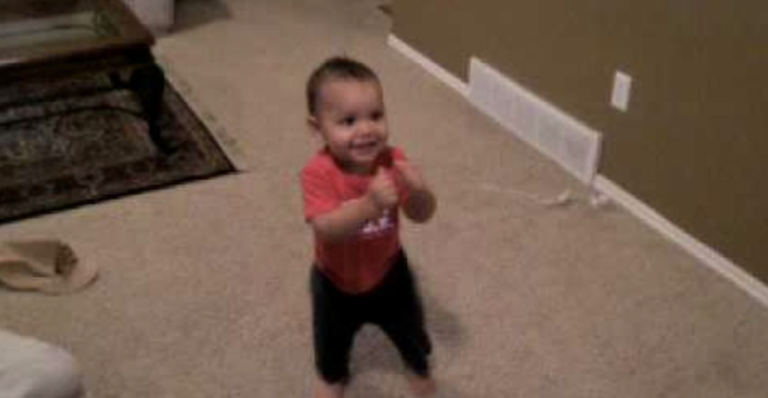 1-Year-Old Old Starts Dancing Salsa. But A Keep a Close Eye on His Feet when He Turns Around