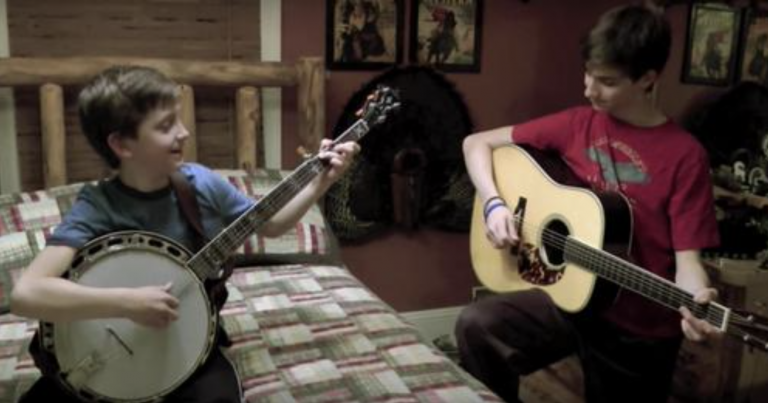 Boy’s Fingers Blur Playing ‘Dueling Banjos’ Then Big Brother Takes It To Next Level