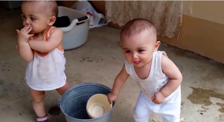 Overabundance of cuteness. VIDEO: Adorable twins play together