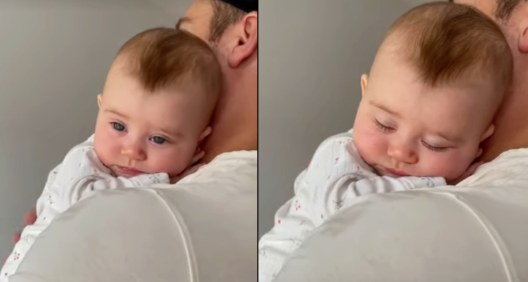 Baby sleeping on dad’s shoulder . You heart will melt