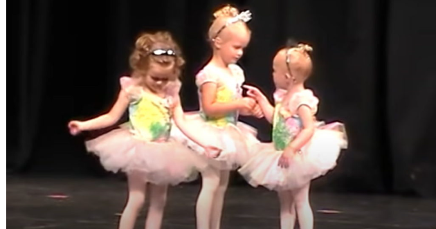 Two small ballerinas begin fighting on stage and steal the show…