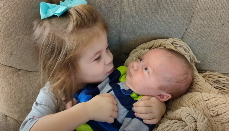 Sisterly Bliss: Darcy’s Tender Embrace With 7-Week-Old Sully