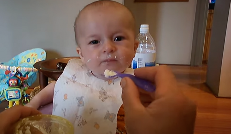 Cooper at 4 months eating Farex mixed with yohgurt for the 1st time.