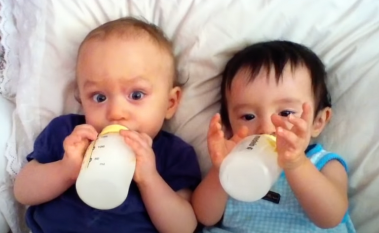 Twin Babies Drinking Milk After Nap