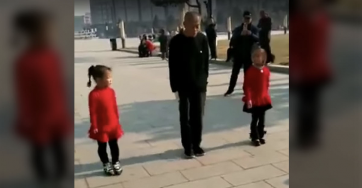 2 Little Girls Line Up With Grandpa For A Unique Dance