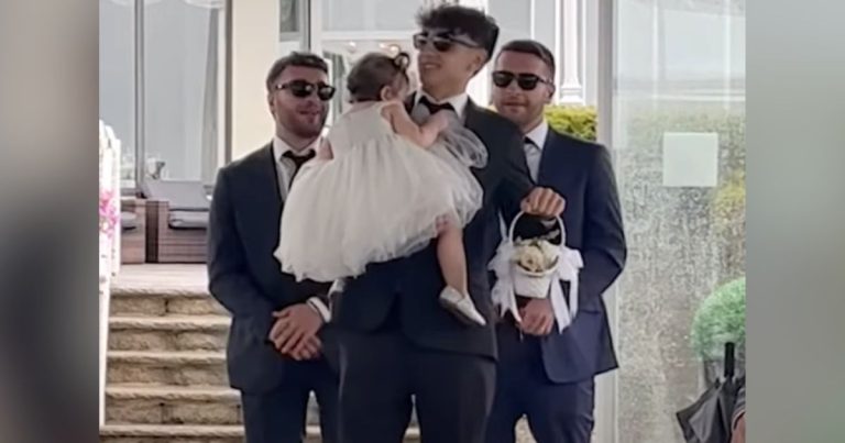 Flower girl falls asleep at wedding so her ‘security team’ hilariously steps in to help