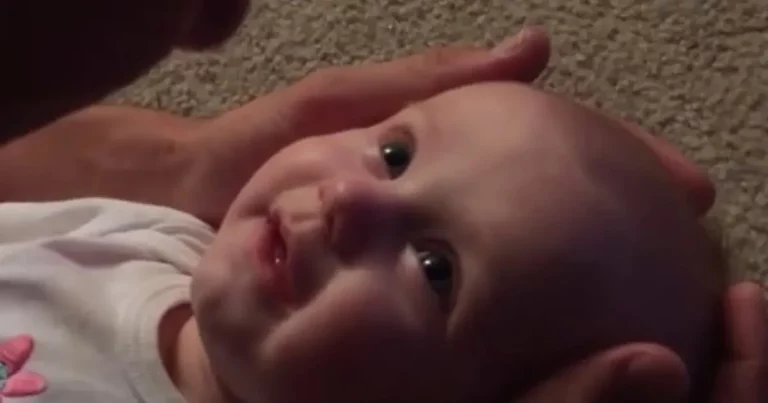 Dad sings to his baby daughter – and her reaction is so pure