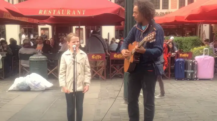 11 Yr-Old Joins Street Musician to Sing ‘Ave Maria’ – When She Does It’s Instant Chills