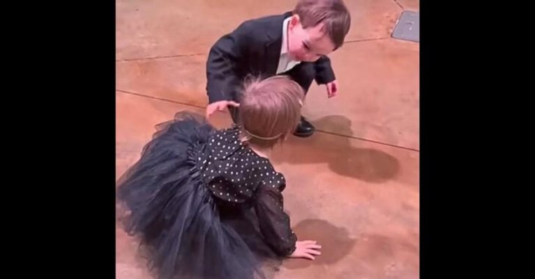 Tiny boy melts 9.9 million hearts when baby girl falls on dance floor