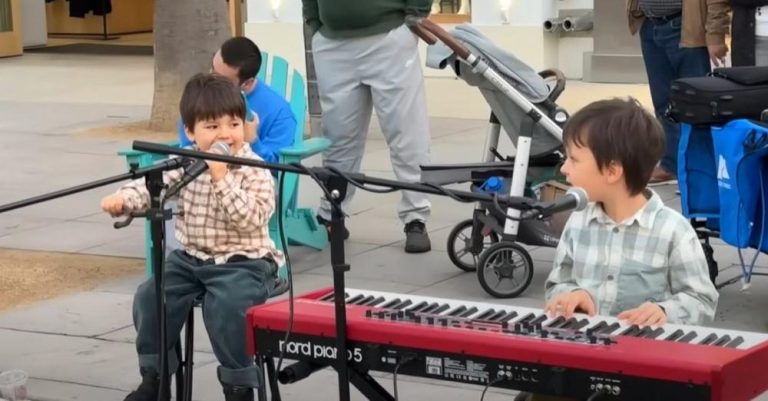 3-year-old serenades passersby with Elvis classic and has hearts melting