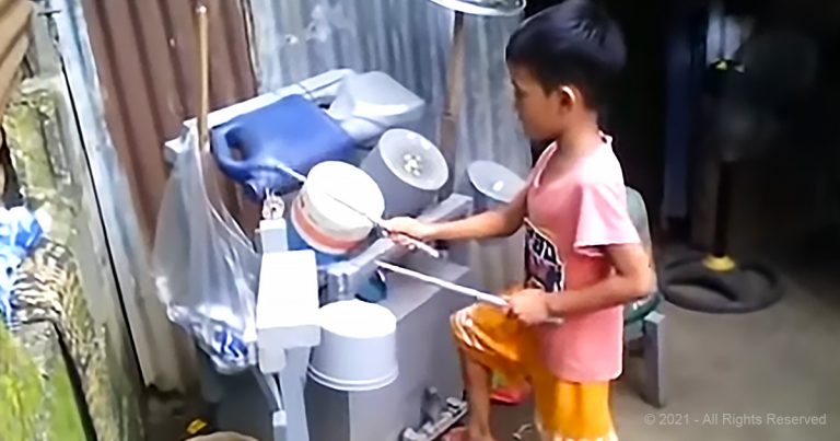 Little drummer boy plays ‘Sweet Child O’ Mine’ on homemade drums