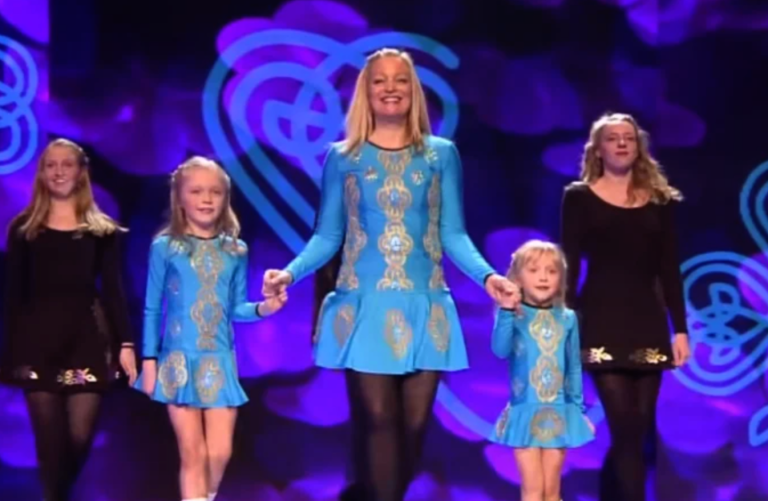 Tiny sister joins older sister on stage and together they bring down the house