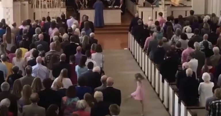 Little Girl Dances In Aisle During Church Service