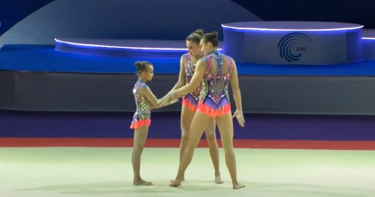 Ladies grab tiny gymnast’s hands then leave crowd in awe with gravity-defying performance