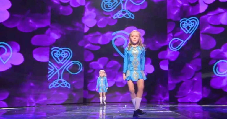 Tiny sister joins older sister on stage and together they bring down the house