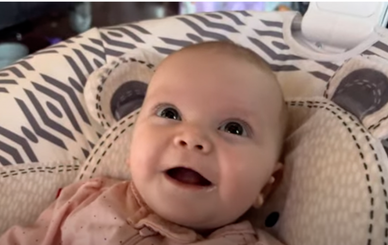 This little baby is very happy to hear his father’s voice