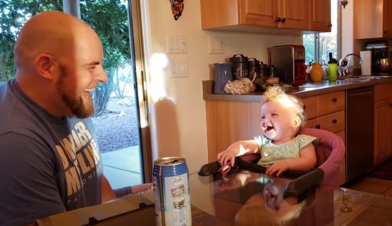 The contagious laugh of this little girl is too adorable. She loves the funny game with her dad