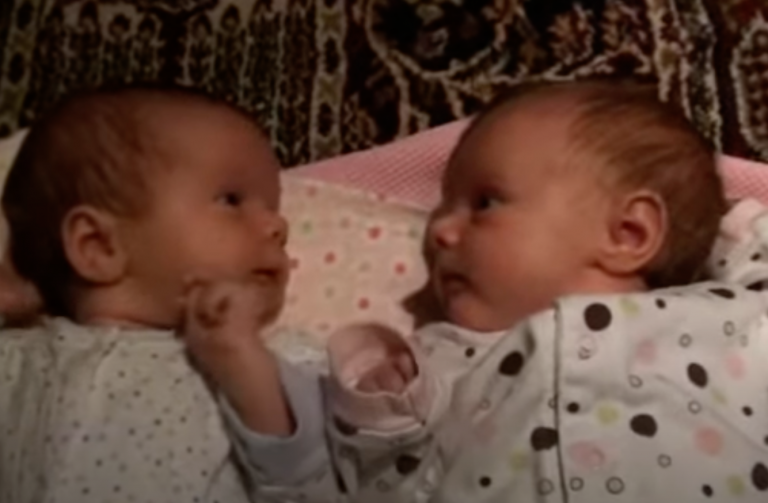 Twin hiccups, talking, and movement—about all they can do