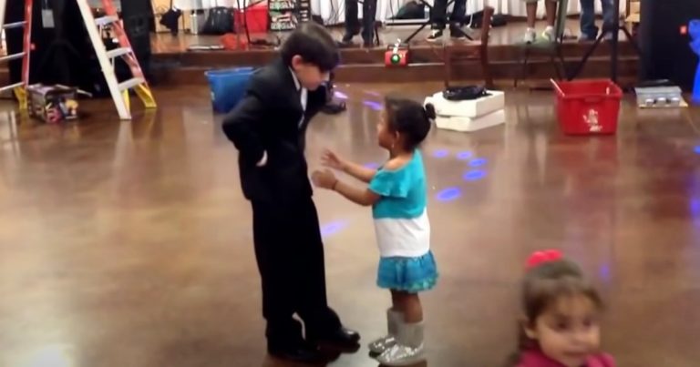 Jealous girl tries to steal boy on dance floor only his response takes the cake