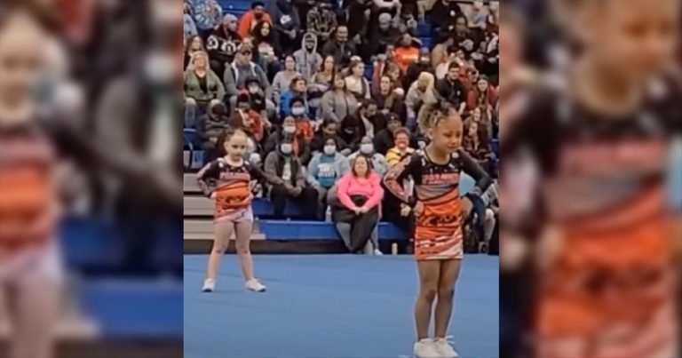 Nervous Cheerleader Finds Her Courage After Crowd Cheers Her On