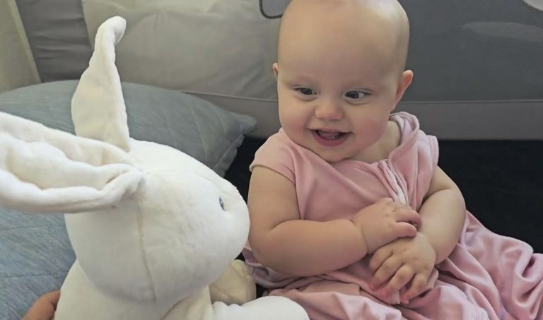 Their bond is sooo beautiful ! Baby girl is playing with a singing bunny